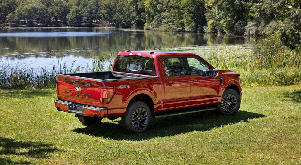 A red 2025 Ford F-150 from the rear at an angle.