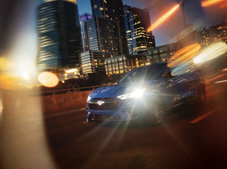 Blue Ford Mustang Mach-e Driving